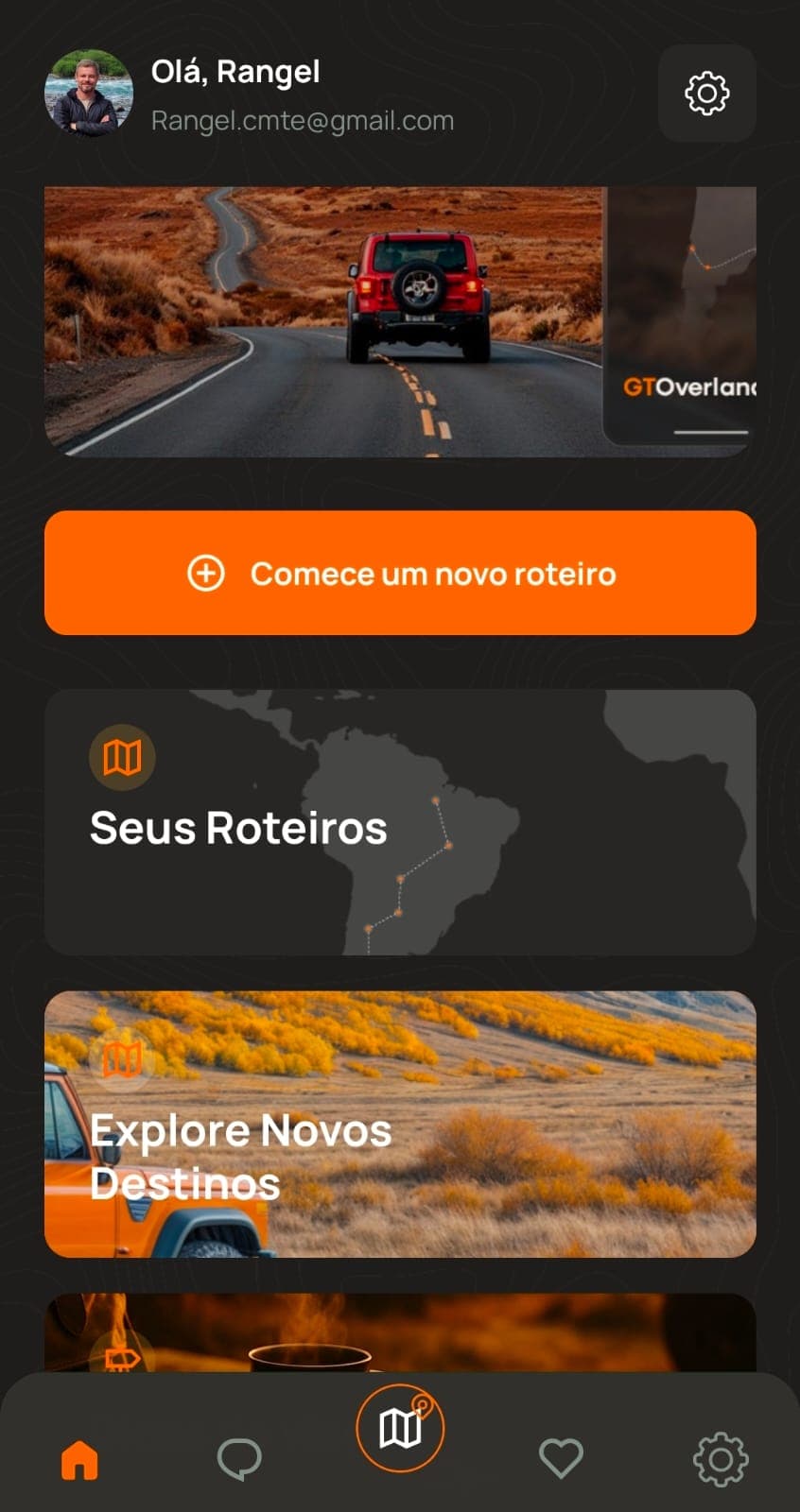 Tela inicial do app GT Overlander mostrando a saudação ao usuário, hero com Jeep na estrada e botão Comece um novo roteiro